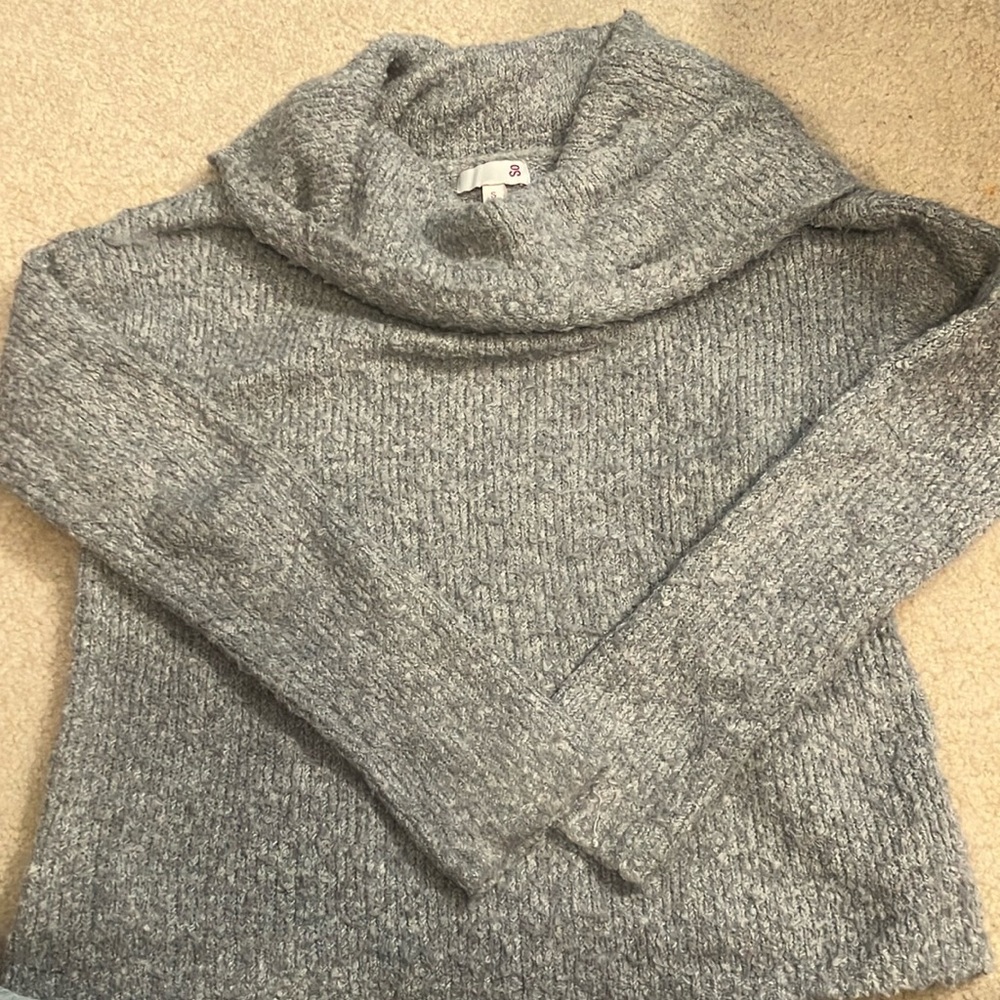 Soft knit gray turtleneck sweater with long sleeves